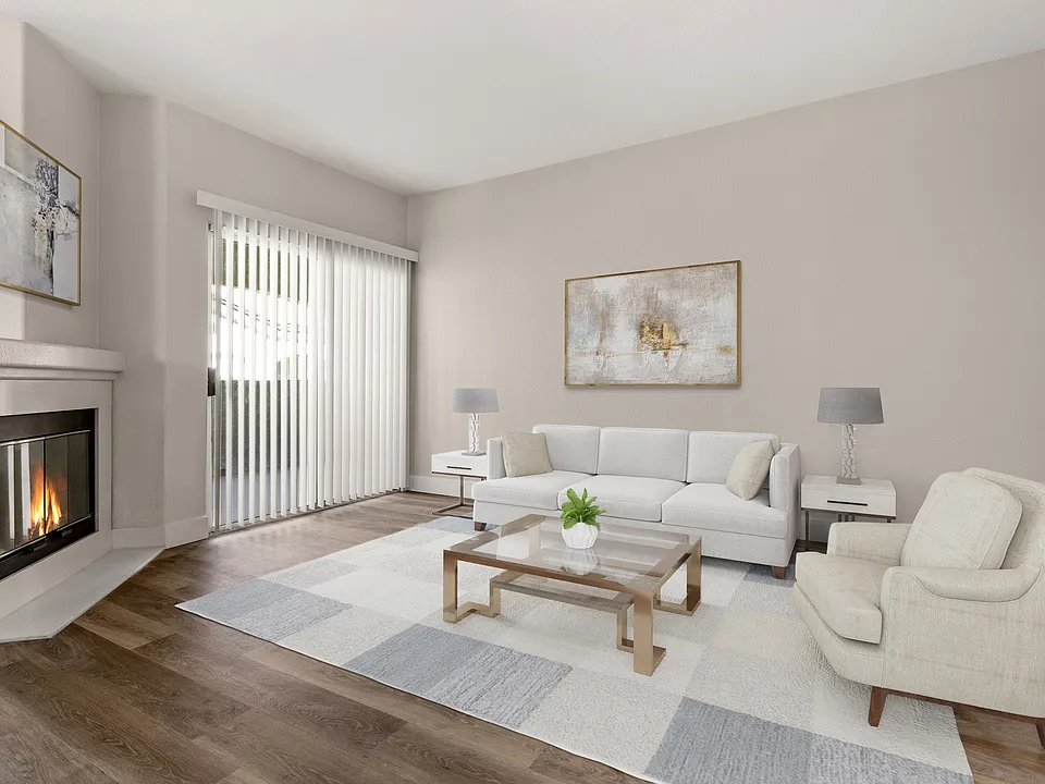 Gather around the fireplace and make every night cozy in your spacious living room.