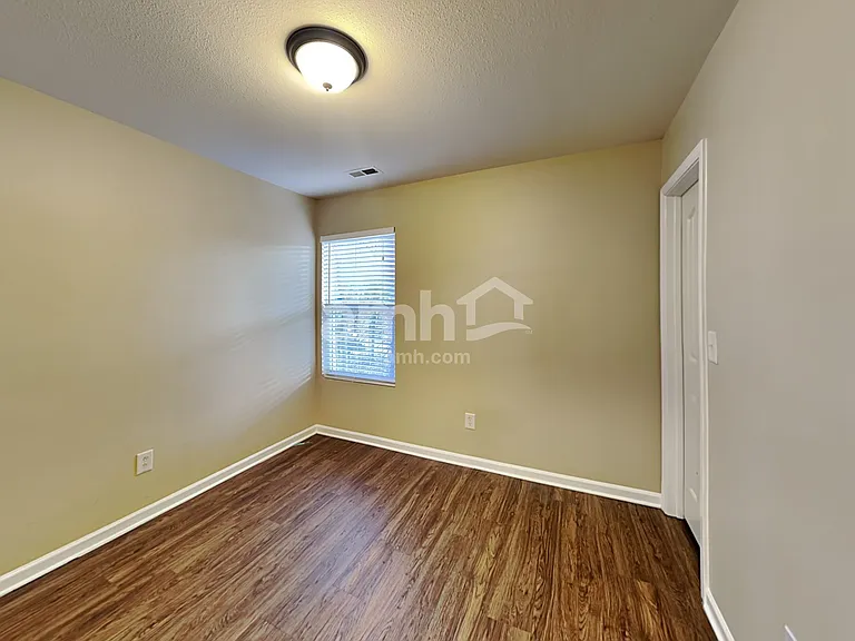 7033 Sunman Rd — Photo 12
