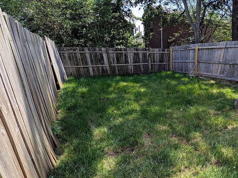 Enjoy your own private outdoor space with a fully fenced backyard_great for kids, or relaxing in the shade.