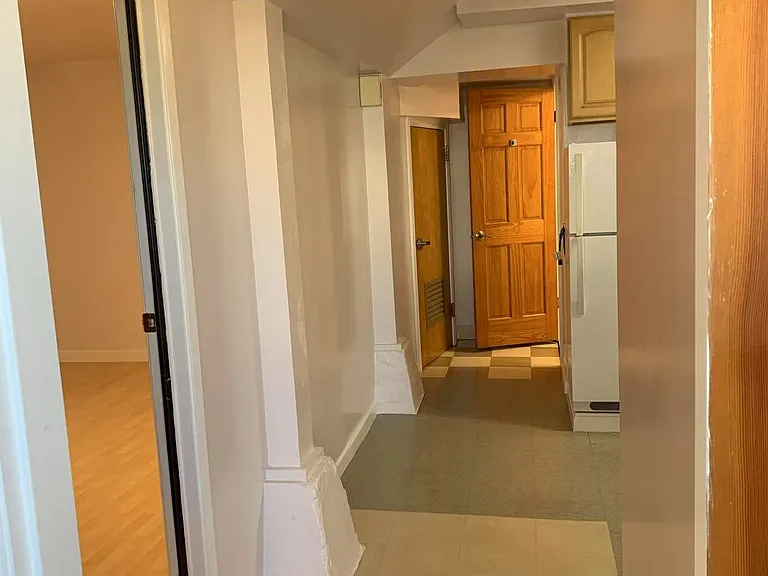 As you enter the unit, you'll find the bedroom immediately to your left. Continue down the hallway to reach the open kitchen and dining area, conveniently located on the right. At the end of the hallway, the bathroom is tucked to the right.