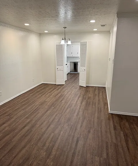 Family area looking at dining area into kitchen