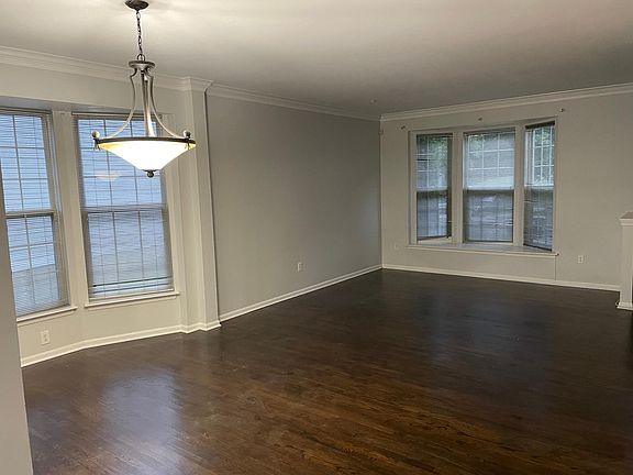 Living room with bay windows