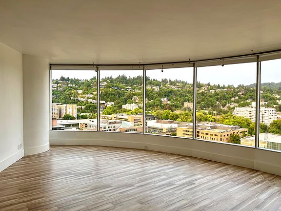 Living room with window shades up.
