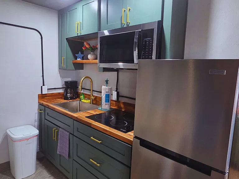 Enjoy a spacious refrigerator designed for convenience during your stay.