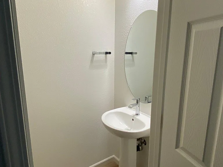Powder bath (1/2 bathroom) downstairs to add convenience for your guests