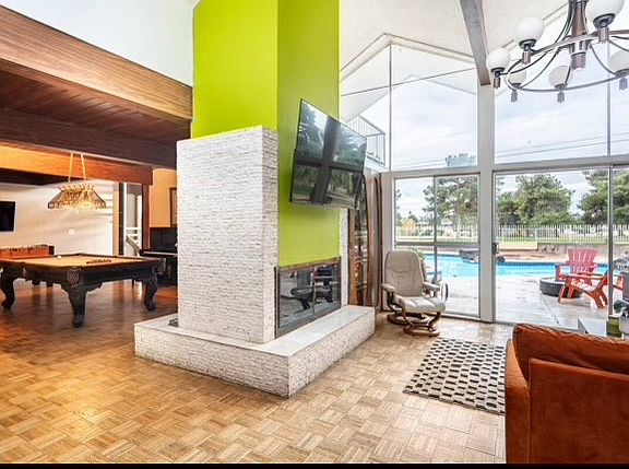FamilyRoom-DoubleFireplace-GameRoom