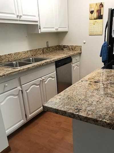 upgraded cabinets, all appliances are stainless, newer sink and granite countertops/