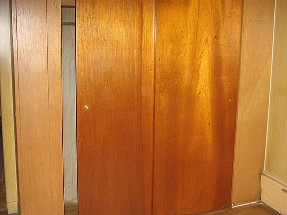 Walk thru bedroom closet