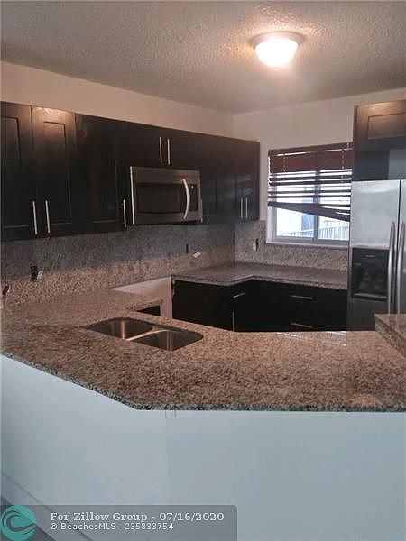 1st image of 8710 N Sherman Cir APT 403