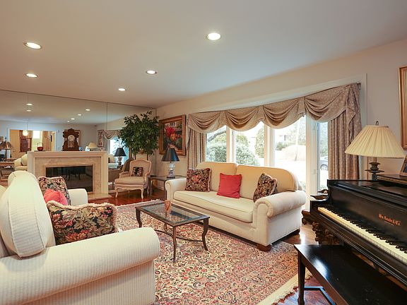 Living room with marble fireplace