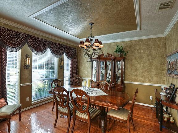 Two walls offer space for furniture pieces.