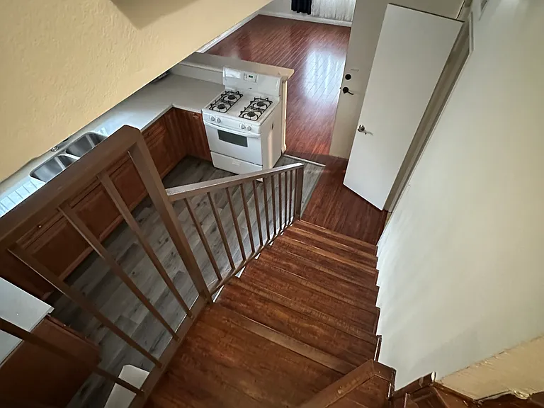 Stairs going down to the Kitchen and the Living room