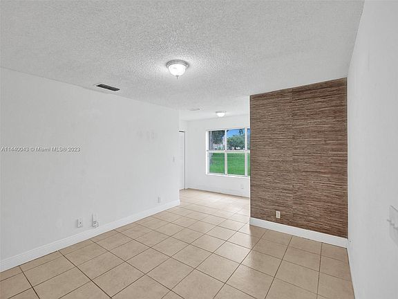 5th image of 3400 Pinewalk Dr N APT 914
