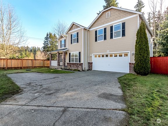 2 car garage and plenty of driveway parking... flat and level too!>
