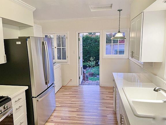 View of recently-renovated kitchen with all new appliances.