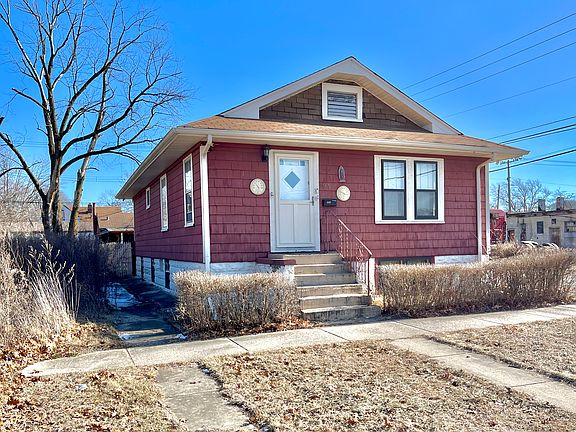 side-walkway (next to empty lot)