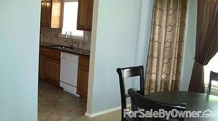 Large kitchen with lots of cabinets