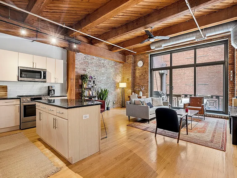 Open-concept living space with easy movement around the kitchen island