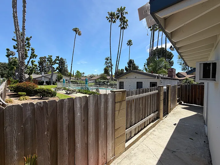 side gate access to community pool