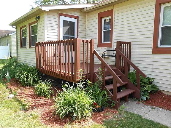 Enter into a multi purpose room.  Can be used as a home office, dining room, mudroom.