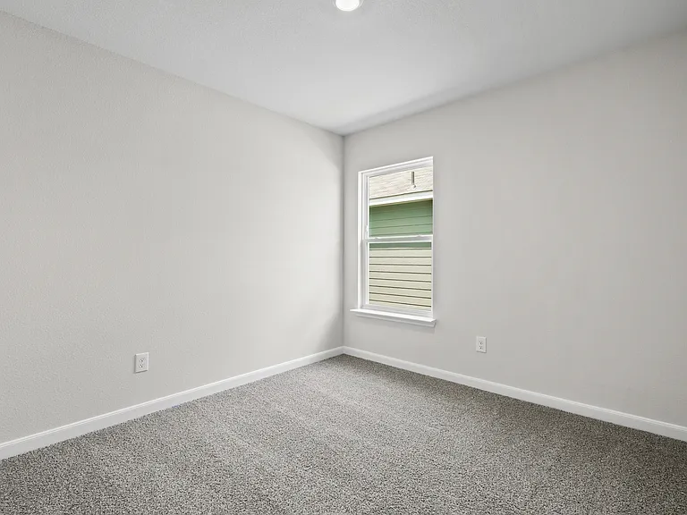 The secondary bedrooms are a great space for a children's bedroom, guest room, or home office.