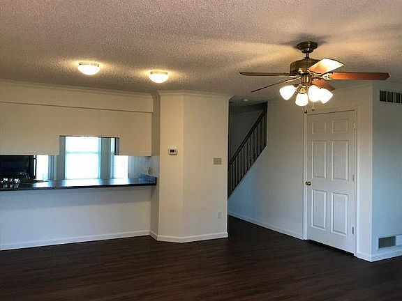 Living room looking into kitchen