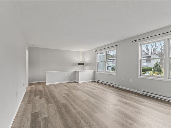 Oversized living room with southwest facing windows with natural light