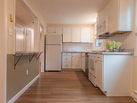 Kitchen with view of peekaboo window