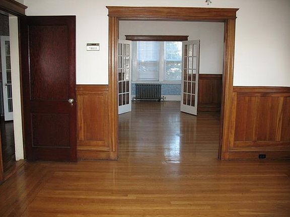 Dining rm. looking into living rm. & sun rm.