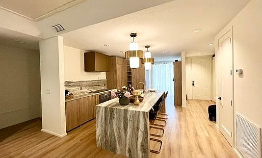 5th image of 3608 54th Dr W Unit 102