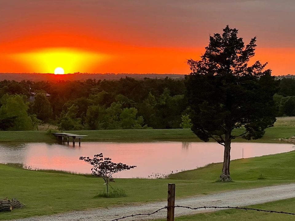 Neighbors pond with sun setting