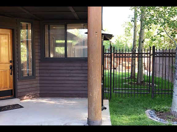 An iron gate completes the 6ft high fenced side and back yards