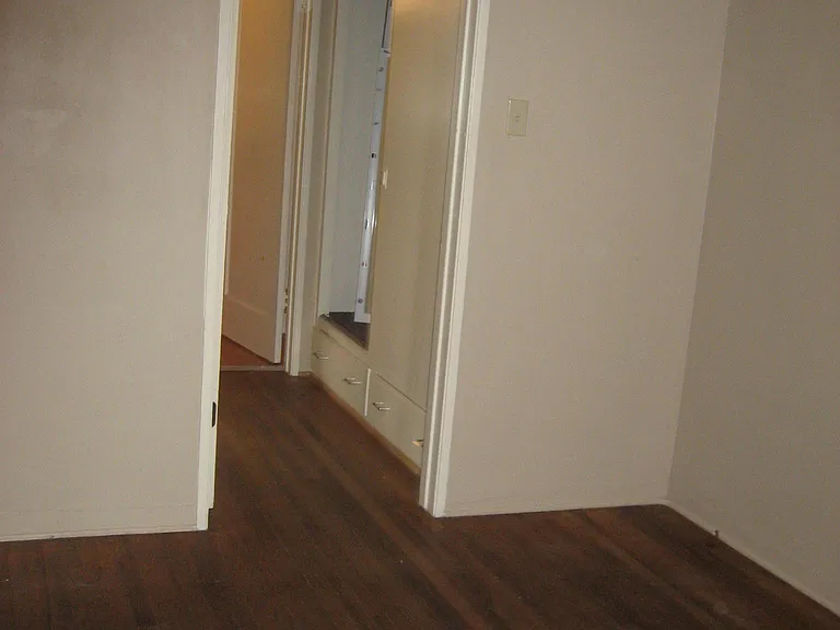 Bedroom looking out, hallway closet
