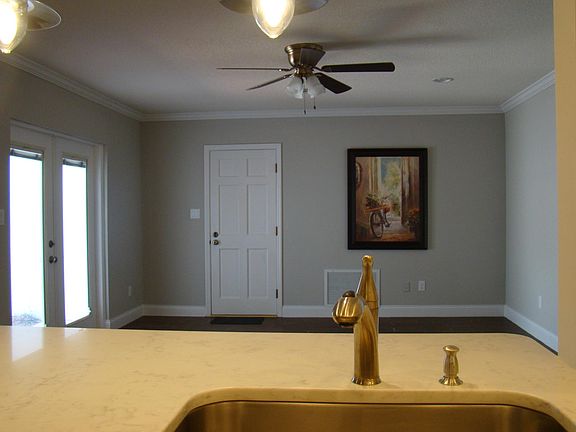 Family room exit to garage and Patio