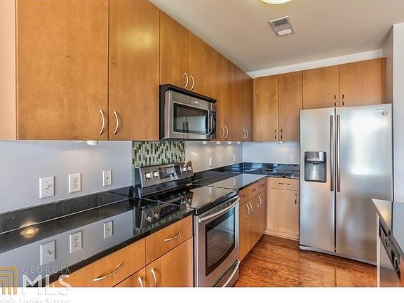 4th image of 711 Cosmopolitan Dr NE Unit 416