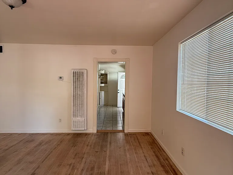 Living room looking into kitchen 
With swamp cooler