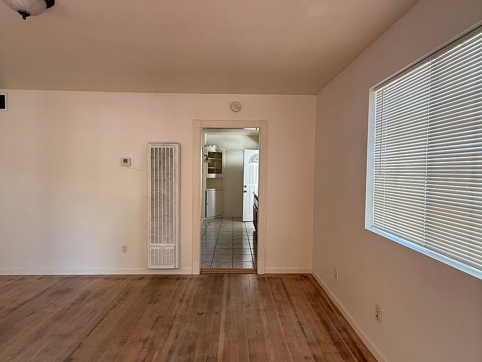 Living room looking into kitchen 
With swamp cooler