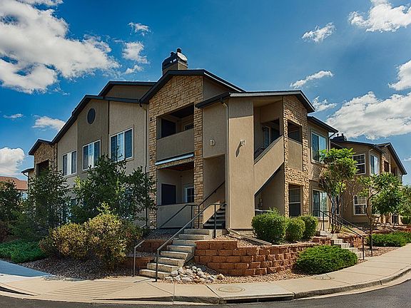Exterior image of the property buildings. The property is Garden Style.