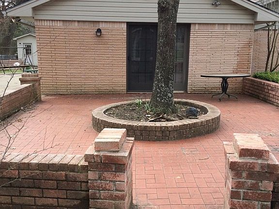 Brick matches den floor.