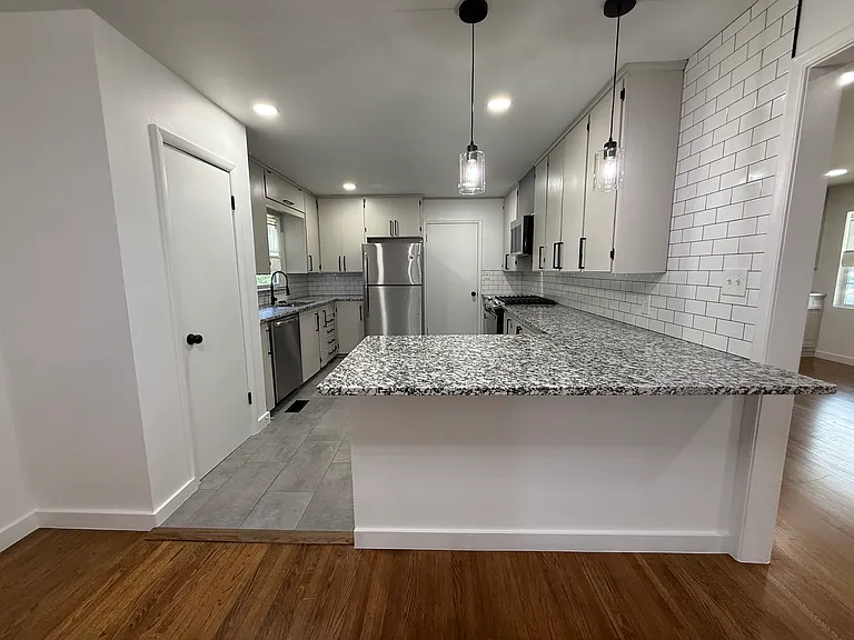 Beautifully updated kitchen with modern finishes and all major appliances included