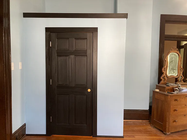 large walk-in closet in bedroom