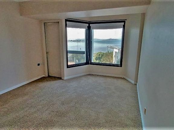 Bedroom with door to balcony