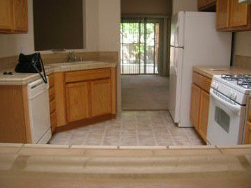 http://www.propertyboss.net/CustomerImages/AMMRE_1205/media/Properties/7005%20Montecito%20Ct%20NW/zsmall_DSCN2688.JPG