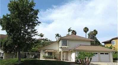 Tile Roof and Three Car Garage