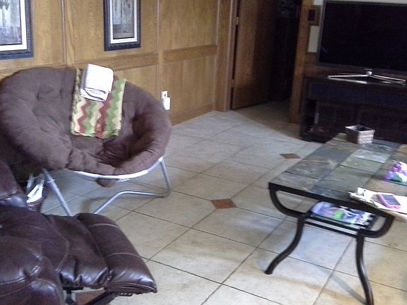 Family room overlooks pool