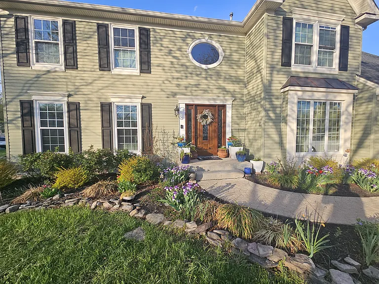 View of current landscaping from the front yard