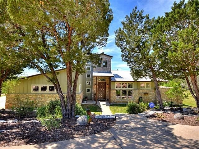 Entry thru custom Mahogany door - notice the observation tower over the entryway.
