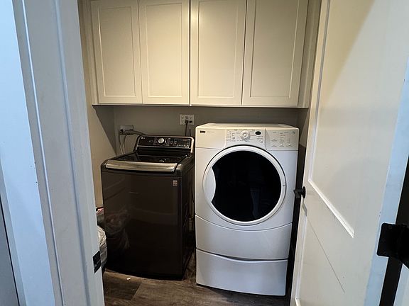 Convenient in-unit laundry with washer and dryer included, or bring your own appliances if preferred. Additional cabinet space for storage.
