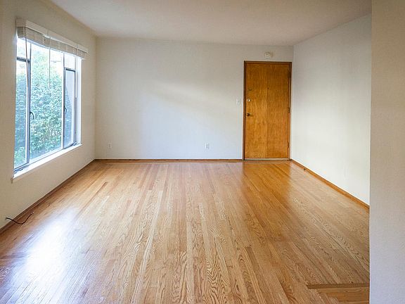 Great size living room with large window.