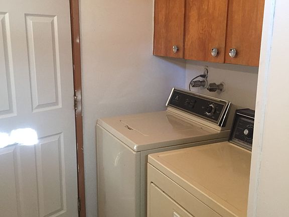 Laundry & storage in Bathroom